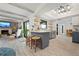 Open living space with eat in kitchen, fire place, and seating at 6604 23Rd W Ave, Bradenton, FL 34209