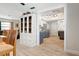 View into living space featuring a dining room, display cabinet, and kitchen at 6604 23Rd W Ave, Bradenton, FL 34209