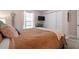 Comfortable main bedroom featuring a queen bed, a window, and large closet at 6604 23Rd W Ave, Bradenton, FL 34209