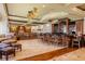 Inviting club interior featuring a stylish bar, cozy seating, and elegant decor for a relaxing social atmosphere at 7016 Lennox Pl, University Park, FL 34201