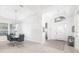 Bright dining room with modern light fixture and adjacent living area at 7016 Lennox Pl, University Park, FL 34201