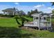 Charming gazebo overlooking a serene pond at 7016 Lennox Pl, University Park, FL 34201