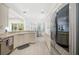Spacious kitchen with stainless steel appliances and abundant cabinet space at 7016 Lennox Pl, University Park, FL 34201