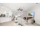 Airy living room filled with lots of natural light and modern decor at 7016 Lennox Pl, University Park, FL 34201