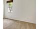 Bright bedroom featuring carpet flooring, a window with tree views, and neutral wall paint at 7158 Westhill Ct, Lakewood Ranch, FL 34202