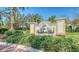 Welcoming sign for The Residents Club, set amidst lush greenery and landscaping at 7158 Westhill Ct, Lakewood Ranch, FL 34202