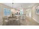 Cozy dining room next to kitchen, featuring a modern table and chairs at 7158 Westhill Ct, Lakewood Ranch, FL 34202