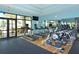 Fitness center featuring modern treadmills, machine weights, and open doorway at 7158 Westhill Ct, Lakewood Ranch, FL 34202