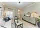 Bright living room with modern furniture, a stylish rug, and neutral decor at 7576 Plantation Cir, Bradenton, FL 34201