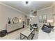 Comfortable living room boasts stylish decor, light-colored walls, and ample seating at 7576 Plantation Cir, Bradenton, FL 34201