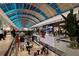 Bright shopping mall with many stores and a decorative vaulted ceiling at 7576 Plantation Cir, Bradenton, FL 34201