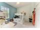bedroom featuring a bunk bed, a desk, and natural light at 8136 Snowy Egret Pl, Bradenton, FL 34202