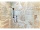 Close up of the tiled walls and shower fixtures at 8136 Snowy Egret Pl, Bradenton, FL 34202