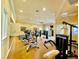 Well-equipped fitness center with treadmills, stationary bikes, and weight machines at 8325 38Th Street E Cir # 107, Sarasota, FL 34243