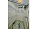Walk-in closet with wire shelving and a unique floor at 8325 38Th Street E Cir # 107, Sarasota, FL 34243