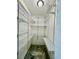 Spacious walk-in closet with shelving and unique flooring at 8325 38Th Street E Cir # 107, Sarasota, FL 34243