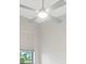 Bedroom featuring a ceiling fan, neutral colored wall, and a window with blinds at 8936 Artisan Way, Sarasota, FL 34240