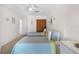 Bright bedroom with two twin beds and a closet at 901 Gulf S Dr # 14, Bradenton Beach, FL 34217