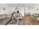 Inviting living area with an open-concept design, seamlessly connecting to the kitchen and dining areas at 901 Gulf S Dr # 14, Bradenton Beach, FL 34217
