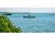 Picturesque waterfront view showcasing boats and serene blue waters at 901 Gulf S Dr # 14, Bradenton Beach, FL 34217