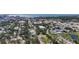 Extensive aerial view showcasing the neighborhood, surrounding greenery, city, and waterfront at 941 N Osprey Ave, Sarasota, FL 34236