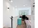 Modern bedroom with desk and exterior view from the staircase landing at 941 N Osprey Ave, Sarasota, FL 34236