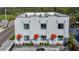 Modern townhouse with clean white facade, red awnings, and convenient parking at 941 N Osprey Ave, Sarasota, FL 34236