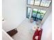 Bright living room features high ceilings, large windows, and a modern chandelier at 941 N Osprey Ave, Sarasota, FL 34236