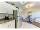 Eat in kitchen features modern stainless steel appliances and tiled floor at 9620 Club South Cir # 5208, Sarasota, FL 34238