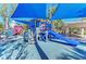 Colorful playground featuring slides and play structures, providing an engaging and safe area for children to enjoy at 9620 Club South Cir # 5208, Sarasota, FL 34238