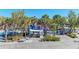 Charming playground with picnic tables and lush trees, offering a fun and shaded outdoor space for children to play at 9620 Club South Cir # 5208, Sarasota, FL 34238