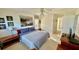 Cozy bedroom with wood furniture at 4812 Sand Trap E Cir, Bradenton, FL 34203