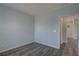 This bedroom features modern flooring and trim; perfect for relaxation at 104 1St Ave, Venice, FL 34285