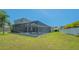 Large backyard includes a screened lanai with a pool and spa at 1085 Mallard Marsh Dr, Osprey, FL 34229