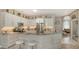 Modern kitchen featuring an island with bar seating, stainless steel appliances, and ample counter space at 1085 Mallard Marsh Dr, Osprey, FL 34229