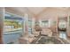 Living room with patio access to the pool area at 1085 Mallard Marsh Dr, Osprey, FL 34229
