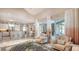 Spacious open-concept living area includes a modern kitchen with island seating and a dining nook at 1085 Mallard Marsh Dr, Osprey, FL 34229