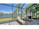 Inviting pool area with lounge chairs, set against a scenic waterfront backdrop, perfect for relaxing outdoors at 1085 Mallard Marsh Dr, Osprey, FL 34229