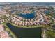 Aerial view of a beautiful community with houses surrounding a scenic lake at 12740 Del Corso Loop, Lakewood Ranch, FL 34211