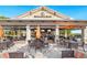 Exterior view of the Bahama Bar with ample outdoor seating and waterfront views at 12740 Del Corso Loop, Lakewood Ranch, FL 34211