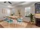 Bright dining room with hardwood floors and lots of natural light from two large windows at 12740 Del Corso Loop, Lakewood Ranch, FL 34211