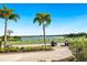 Scenic golf course with lush fairways and a beautiful lake view at 12740 Del Corso Loop, Lakewood Ranch, FL 34211