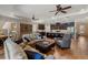 Open concept living room and kitchen combination with hardwood floors and updated appliances at 12740 Del Corso Loop, Lakewood Ranch, FL 34211