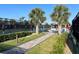 Outdoor pickleball courts with shade trees and landscaped surroundings at 13724 Quinta St, Venice, FL 34293
