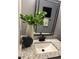 Bathroom vanity with granite countertop, modern faucet, with decorative mirror and interior design at 1461 17Th St, Sarasota, FL 34234