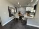 Charming dining area with modern furnishings, stylish decor, and adjacent kitchen space at 1461 17Th St, Sarasota, FL 34234