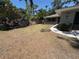 Expansive front yard showing the property's landscape and curb appeal in a residential setting at 1461 17Th St, Sarasota, FL 34234