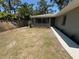 Inviting front yard with a stone walkway leading to the entrance, enhancing the property's welcome at 1461 17Th St, Sarasota, FL 34234