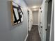 Hallway showcasing stylish decor, neutral paint, and modern lighting fixtures at 1461 17Th St, Sarasota, FL 34234