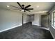 Bright living room with modern gray tile flooring and an open layout perfect for entertaining at 1461 17Th St, Sarasota, FL 34234